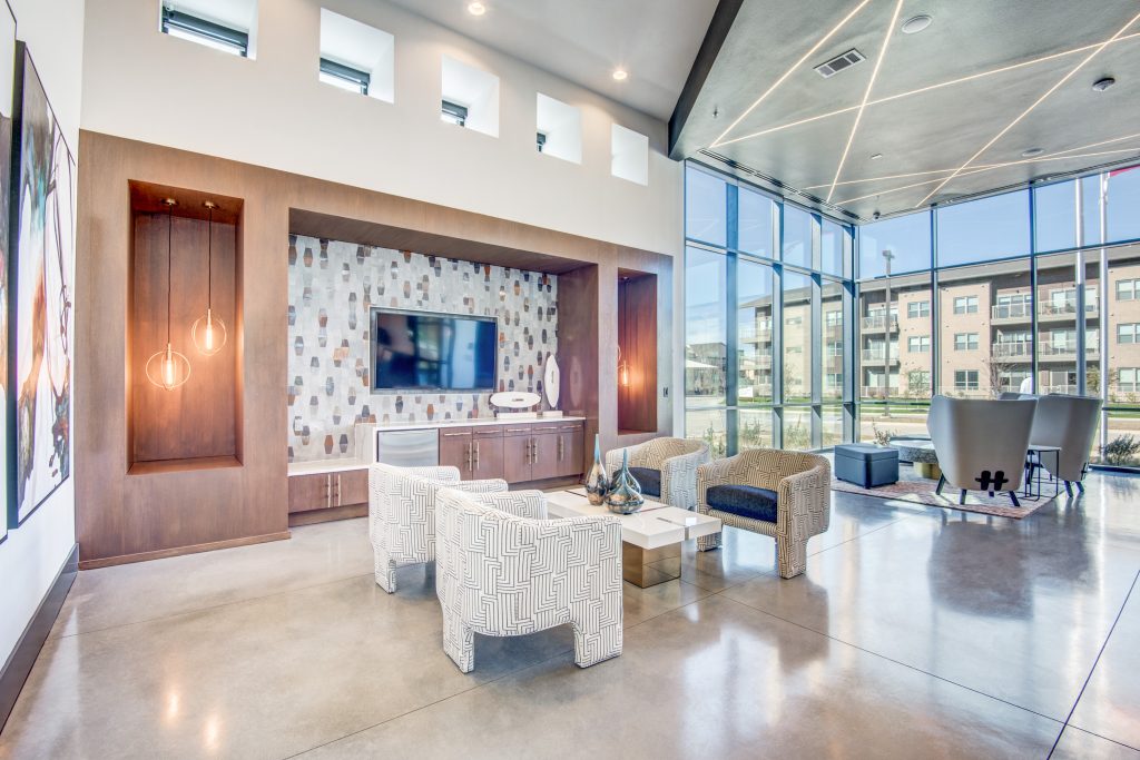 Lobby Area with seating and large TV on wall